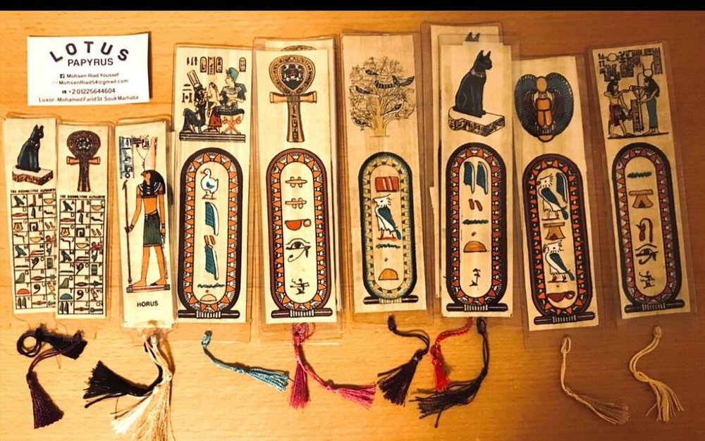 Luxor papyrus and gemstone items flat lay